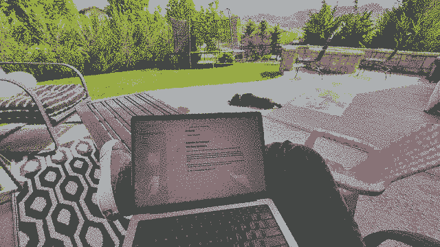 Working on a laptop outside